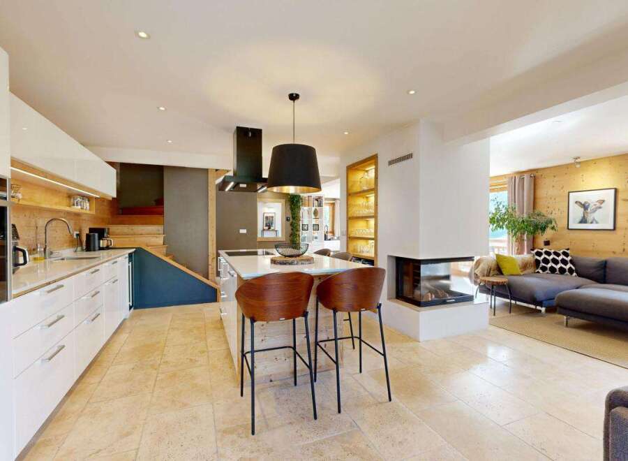 Experience modern living in this stunning open-plan kitchen and living area.