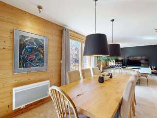 Experience rustic charm and modern comfort in this inviting dining area.