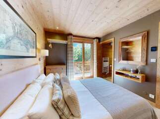 Experience rustic charm and modern comfort in this beautifully appointed bedroom.