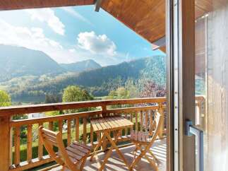 Enjoy breathtaking mountain views from this charming balcony, perfect for morning coffee or evening relaxation.