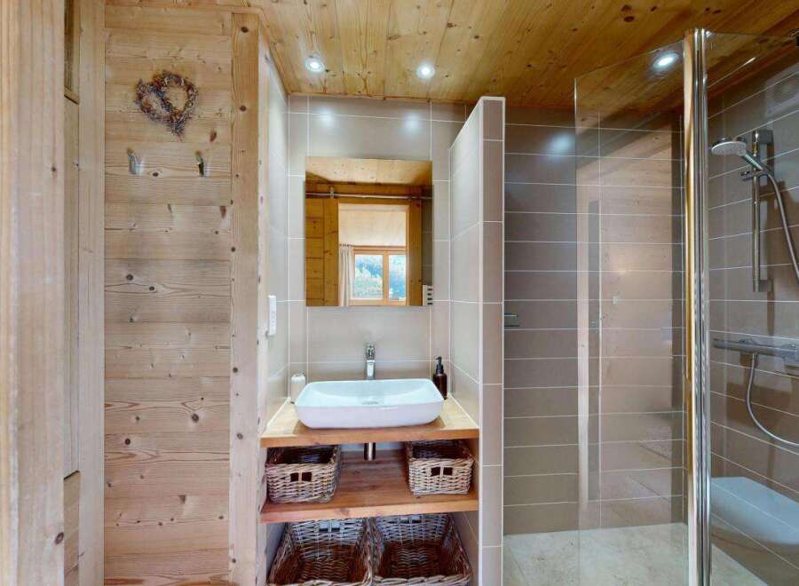 Experience rustic charm and modern convenience in this beautifully appointed bathroom.