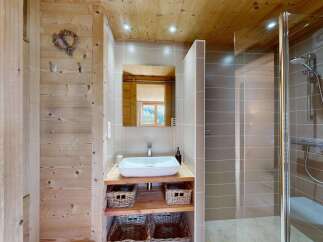 Experience rustic charm and modern convenience in this beautifully appointed bathroom.