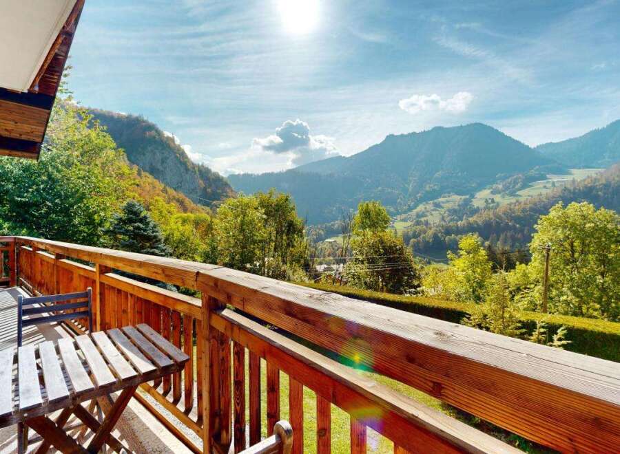Enjoy breathtaking mountain views from this charming balcony, perfect for your morning coffee or evening relaxation.