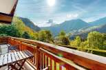 Enjoy breathtaking mountain views from this charming balcony, perfect for your morning coffee or evening relaxation.