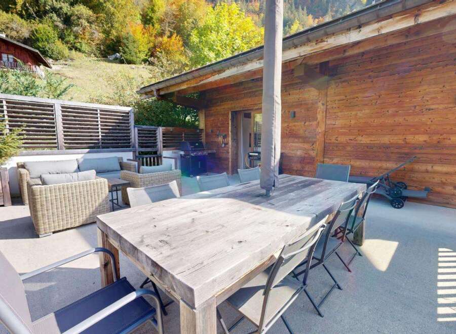 Enjoy outdoor living on this spacious patio, perfect for entertaining.