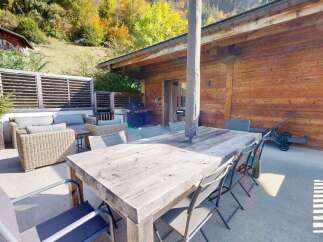 Enjoy outdoor living on this spacious patio, perfect for entertaining.