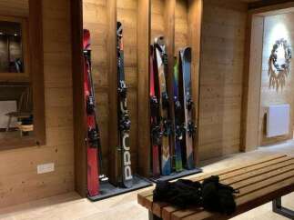 Experience the ultimate ski lodge ambiance with this beautifully appointed ski room.