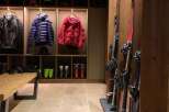 Experience the ultimate ski lodge ambiance with this meticulously organized ski room.