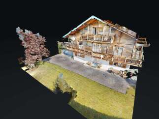 Experience the charm of this rustic wooden chalet, featuring multiple balconies and a spacious outdoor area perfect for enjoying mountain views.