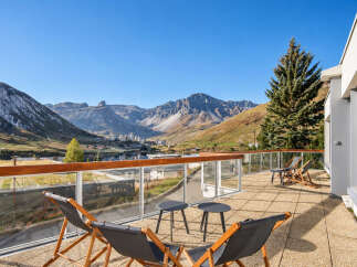 Experience breathtaking mountain views from this stunning balcony, perfect for enjoying your morning coffee or evening relaxation.