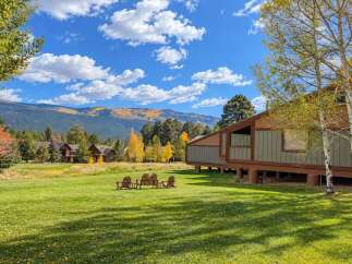 Experience the beauty of autumn in this stunning mountain property.
