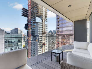 Experience luxury urban living with this stunning balcony offering panoramic city views.