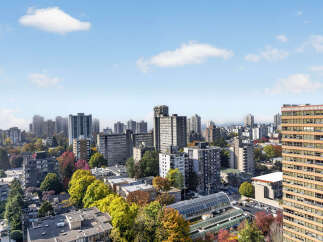 Experience urban living at its finest with this stunning aerial view of a vibrant city neighborhood.
