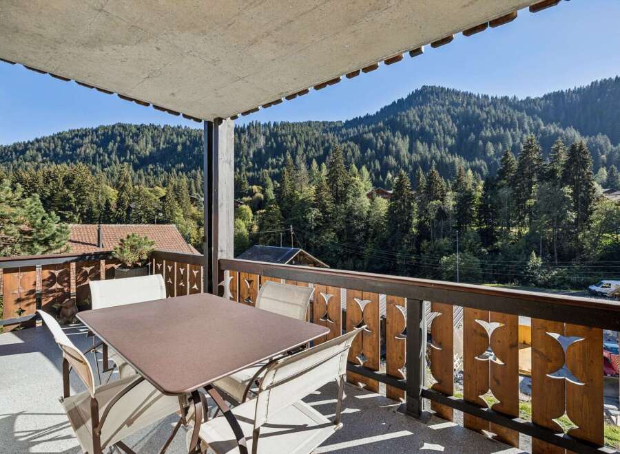 Enjoy breathtaking mountain views from this charming balcony, perfect for your morning coffee or evening relaxation.