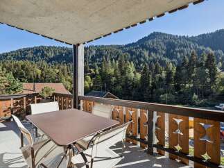Enjoy breathtaking mountain views from this charming balcony, perfect for your morning coffee or evening relaxation.
