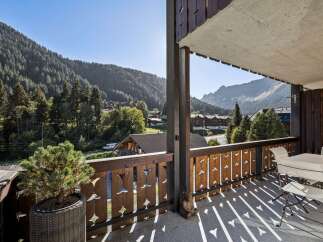 Enjoy breathtaking mountain views from this charming balcony, perfect for your morning coffee or evening relaxation.