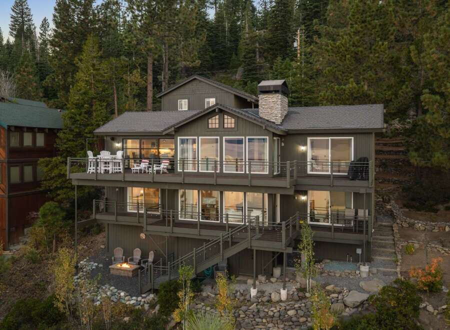 This multi-level home offers stunning views from its expansive decks, perfect for outdoor entertaining.