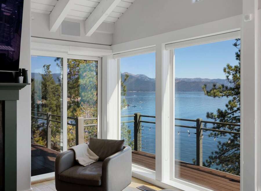 Experience breathtaking lake and mountain views from this stunning living space.