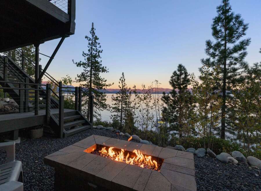 Enjoy breathtaking sunset views over the lake from this stunning property.