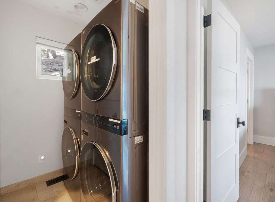Discover the convenience of a stacked LG washer and dryer set, perfect for maximizing space in your laundry area.