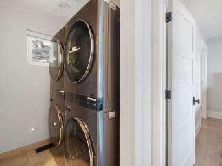 Discover the convenience of a stacked LG washer and dryer set, perfect for maximizing space in your laundry area.