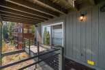 Enjoy breathtaking lake views from this expansive deck, perfect for outdoor entertaining or quiet relaxation.