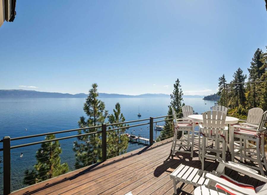 Enjoy breathtaking lake views from this stunning deck, perfect for entertaining or relaxing.