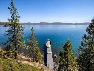 Experience breathtaking lakefront living with this stunning property.