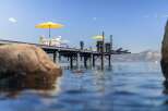 Enjoy the ultimate lakeside living with this stunning property featuring a private dock perfect for your boat and water toys.