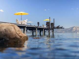 Enjoy the ultimate lakeside living with this stunning property featuring a private dock perfect for your boat and water toys.