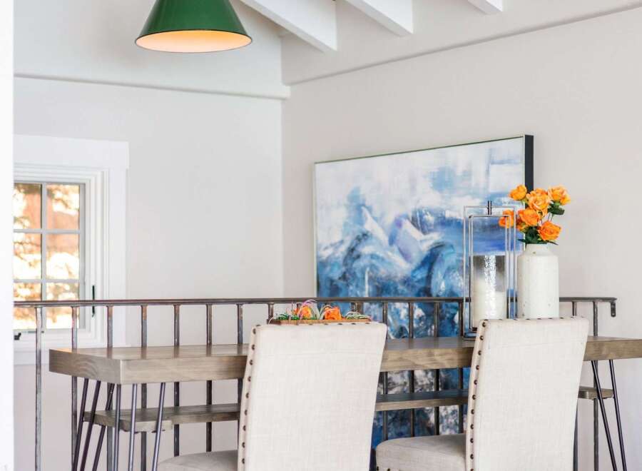Elevate your dining experience with this stylish high-top table and chairs, perfect for a modern kitchen or dining area.