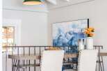 Elevate your dining experience with this stylish high-top table and chairs, perfect for a modern kitchen or dining area.