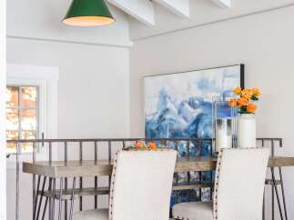Elevate your dining experience with this stylish high-top table and chairs, perfect for a modern kitchen or dining area.