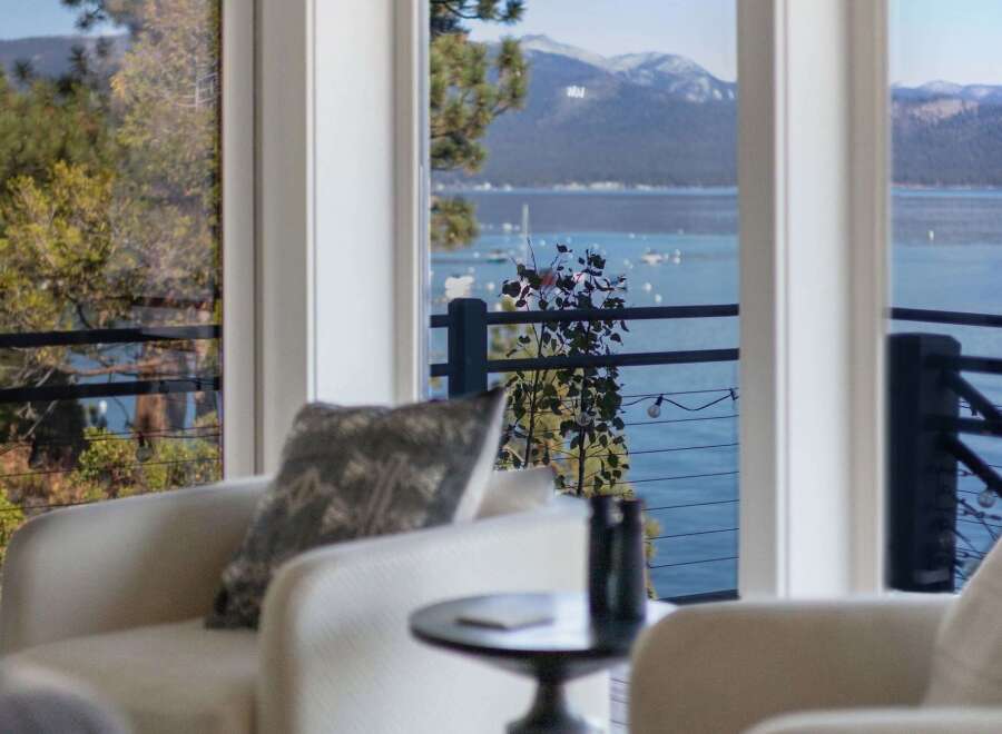 Experience breathtaking lake and mountain views from this stunning property.
