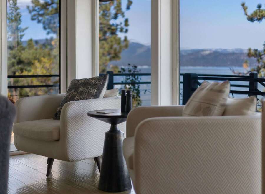 Experience breathtaking lake and mountain views from this stunning living space.
