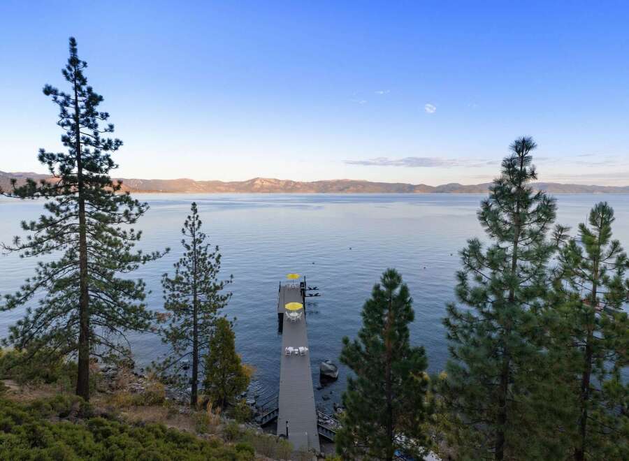 Experience serene lakefront living with this stunning property.