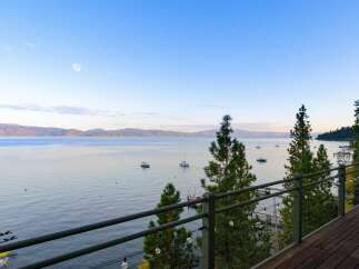 Experience breathtaking lake views from this stunning property, perfect for those seeking a serene retreat.