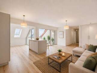Experience modern living in this spacious open-plan apartment featuring a sleek kitchen island and a bright, airy living area.