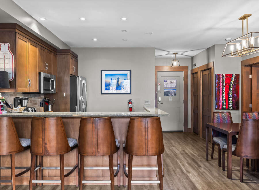 Step into this inviting kitchen and dining area, perfect for entertaining.