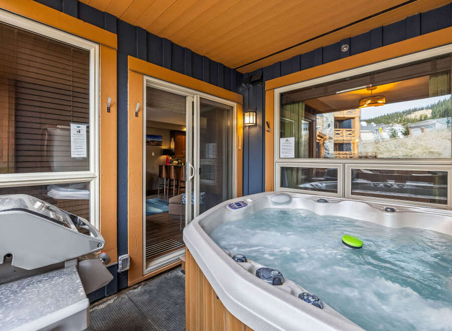 Enjoy ultimate relaxation with this luxurious hot tub, perfect for unwinding after a day of adventure.