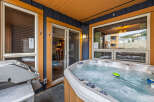 Enjoy ultimate relaxation with this luxurious hot tub, perfect for unwinding after a day of adventure.