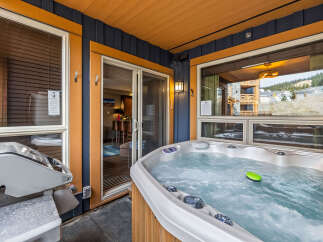 Enjoy ultimate relaxation with this luxurious hot tub, perfect for unwinding after a day of adventure.