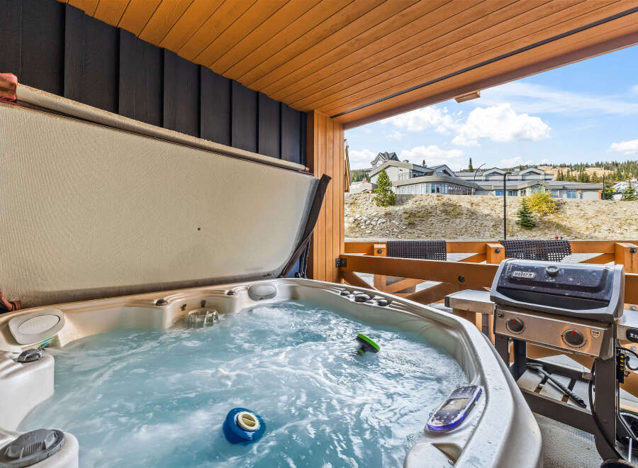 Enjoy ultimate relaxation with this luxurious hot tub, perfect for unwinding after a day of adventure.