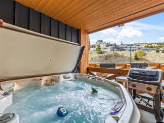 Enjoy ultimate relaxation with this luxurious hot tub, perfect for unwinding after a day of adventure.