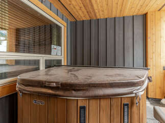 Indulge in ultimate relaxation with this luxurious Marquis hot tub, perfect for unwinding after a long day.