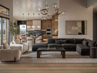 Experience modern luxury in this open-concept living space, featuring a spacious sectional sofa, elegant armchairs, and a striking abstract art piece.