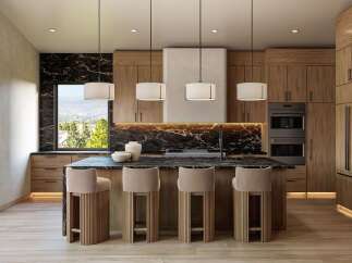 Experience luxury in this modern kitchen featuring a sleek black marble island and backsplash, complemented by warm wood cabinetry.