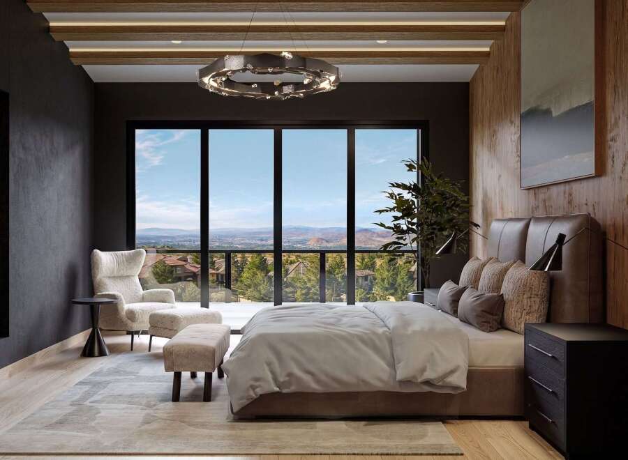 Experience luxury living in this stunning bedroom with panoramic views.