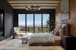 Experience luxury living in this stunning bedroom with panoramic views.