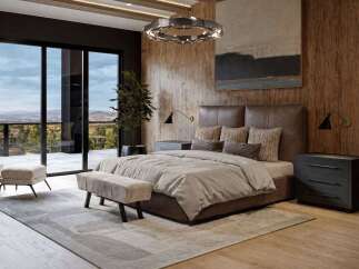 Experience luxury living in this master bedroom, featuring a king-size bed with a rich brown leather headboard and plush bedding.